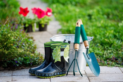Professional decking services preparing a garden base in Frognal