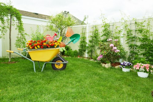 Lawn care and pruning work by gardeners in Frognal